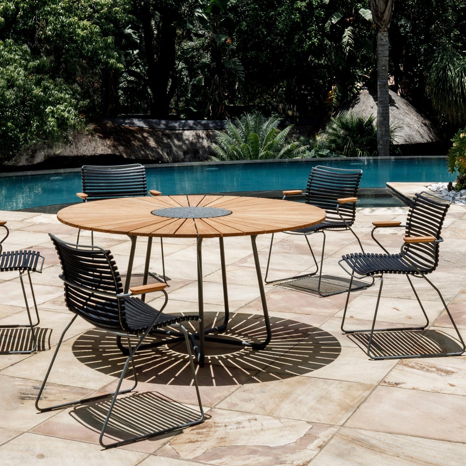 Outdoor dining set with round table and chairs